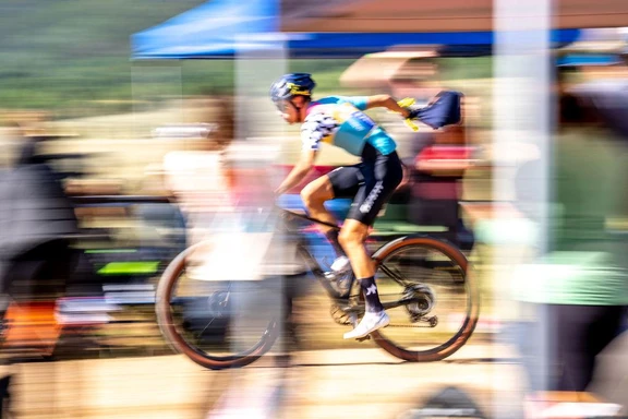cyclist moving fast on a blurred background