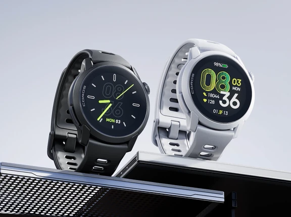 Two COROS PACE 4 sport watches in black and white displaying time and fitness metrics.
