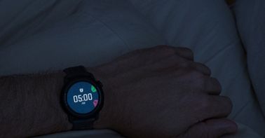 A close-up image of the alarm showing 5am on a black COROS PACE 3 watch. 