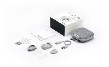 An image showing that the COROS POD 2 package includes the sensor, charging cable, charging dock, wristband clip, shoe clips and a compact case.